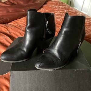Frye black leather booties.  Zipper sides and 2” heel.